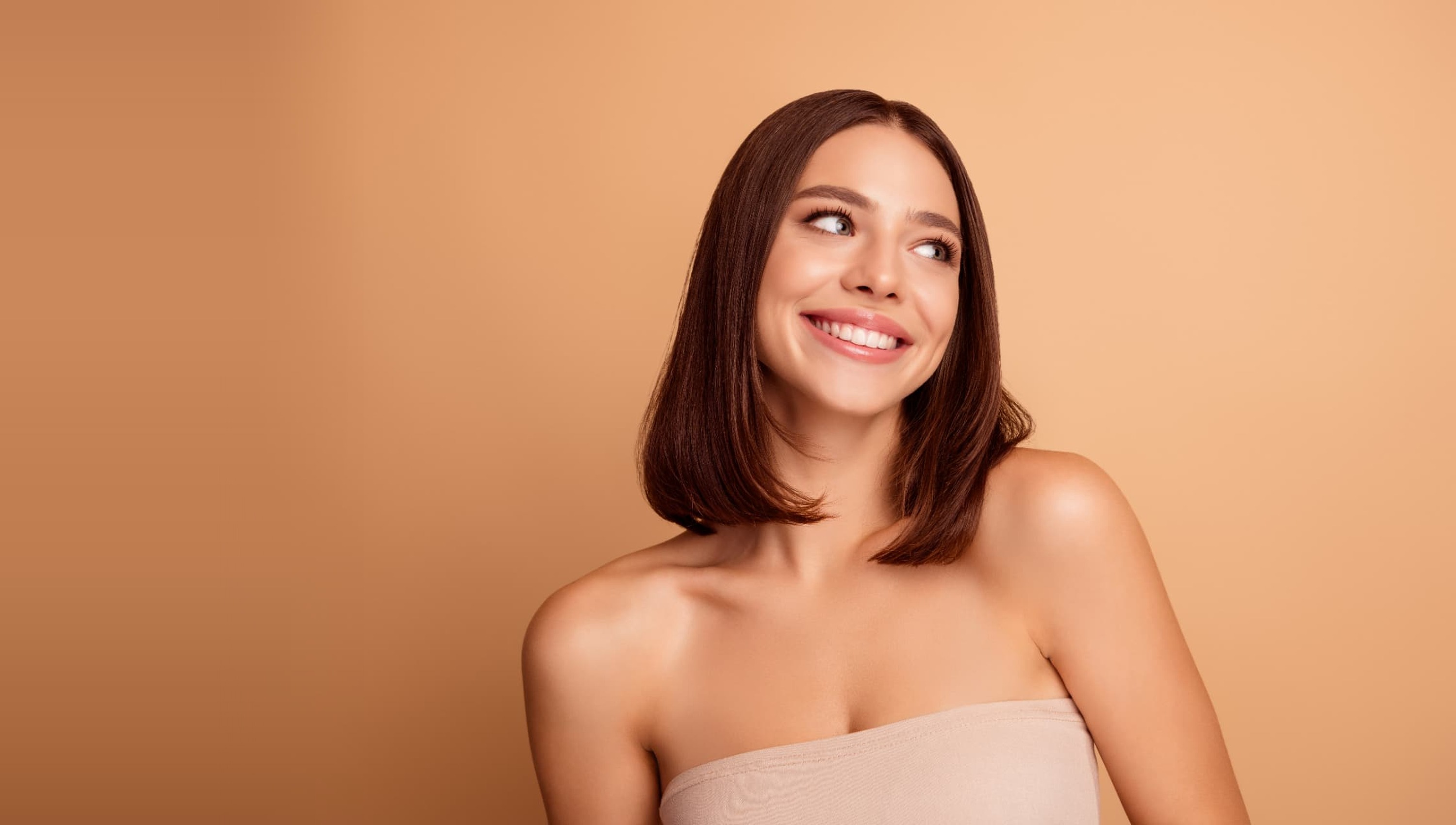 Woman with smooth, glowing skin after fractional resurfacing